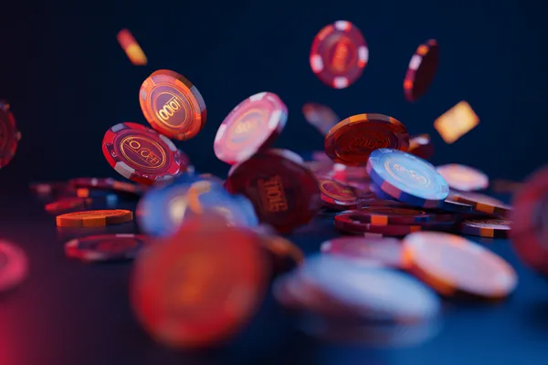 JLWILD Mobile App — Your complete hub for casino and sports A man focused on his laptop with live stats in the background, highlighting the dedicated sports and gaming features of the JLWILD mobile app.